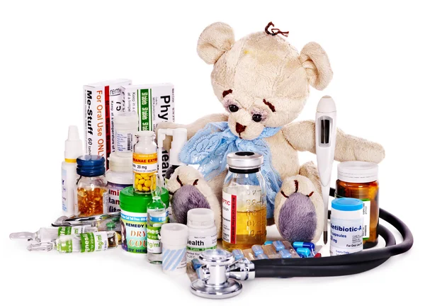 Kind geneeskunde en teddy bear. — Stockfoto