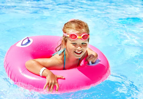 Children sitting on inflatable ring. — Stock Photo, Image