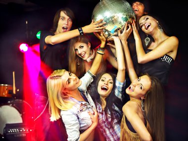 Woman on disco in night club. clipart