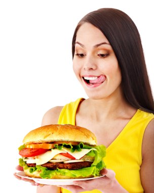 Woman holding hamburger. clipart