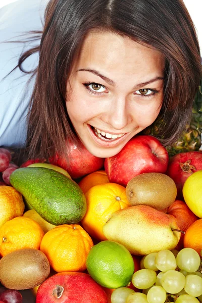 Happy girl with group of fruit. — Stock Photo, Image