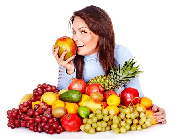 Girl with group of fruit and vegetables. — Stock Photo, Image