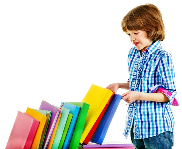 Bambino con pila di libri . — Foto Stock