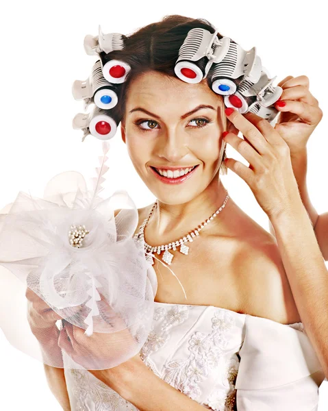 Kvinna bära locktänger på huvudet. — Stockfoto