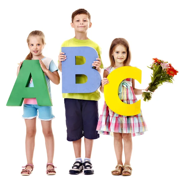 Children holding abc. — Stock Photo, Image