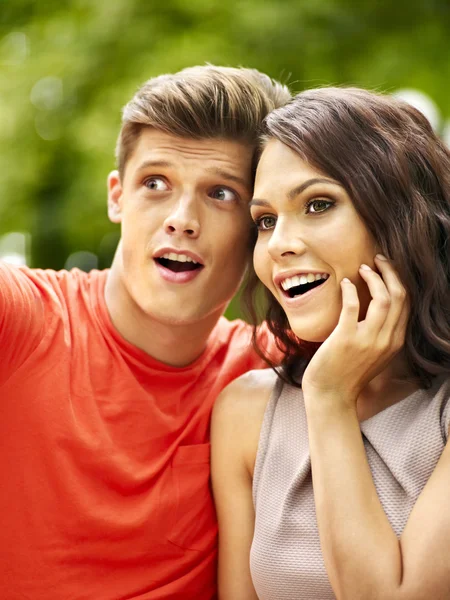 Couple with flower at park. — Stock Photo, Image