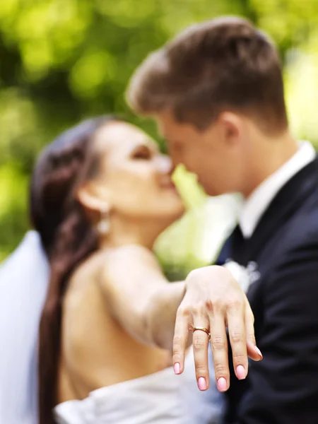 Groom kissing bride. — Stock Photo, Image