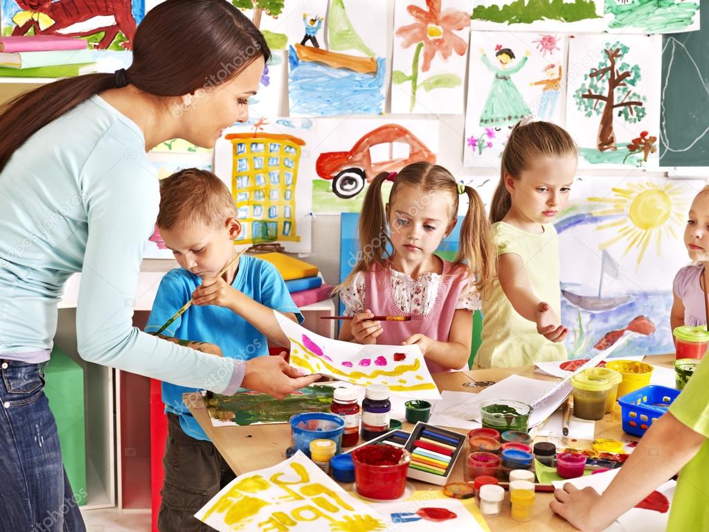 Children with teacher at school.