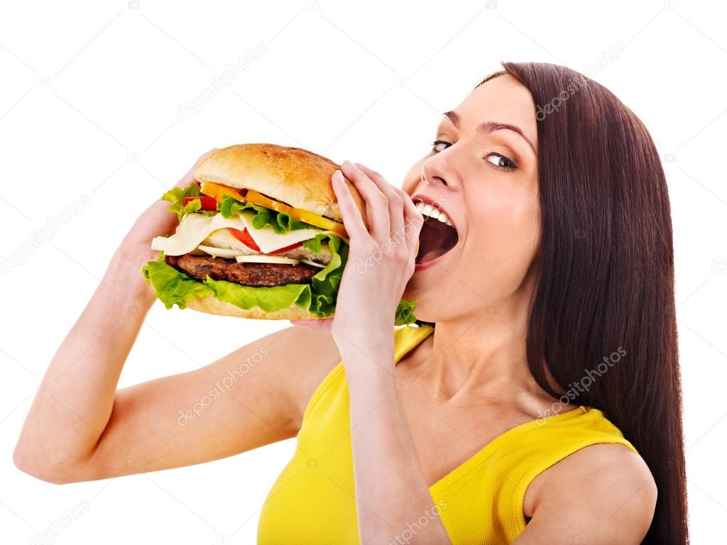 Woman holding hamburger.