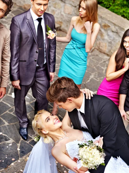 Groom kissing bride . — Stock Photo, Image