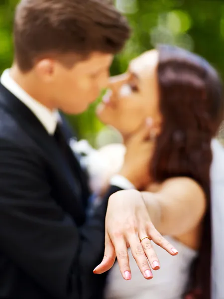 Groom kissing bride. — Stock Photo, Image