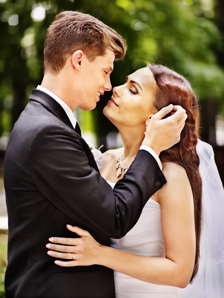 Groom embrace bride . — Stock Photo, Image