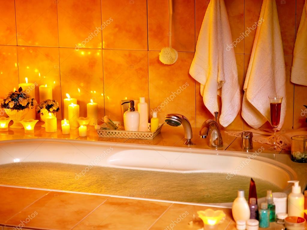 Bathroom interior with bubble bath. Stock Photo by ©poznyakov 30143287