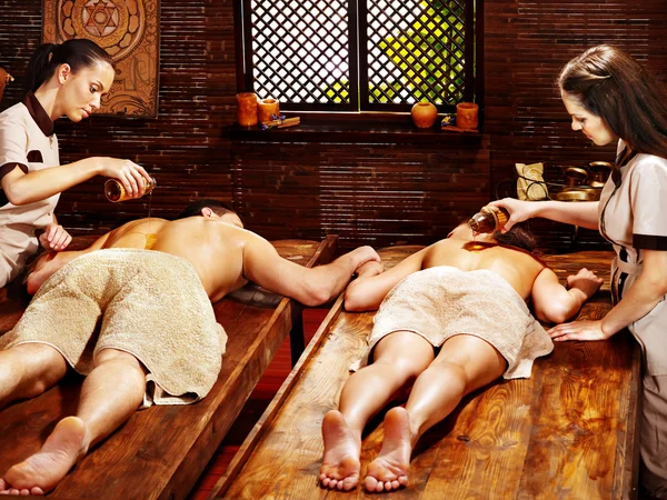 Couple having Ayurvedic spa treatment. — Stock Photo, Image