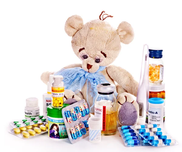 Child medicine and teddy bear. — Stock Photo, Image