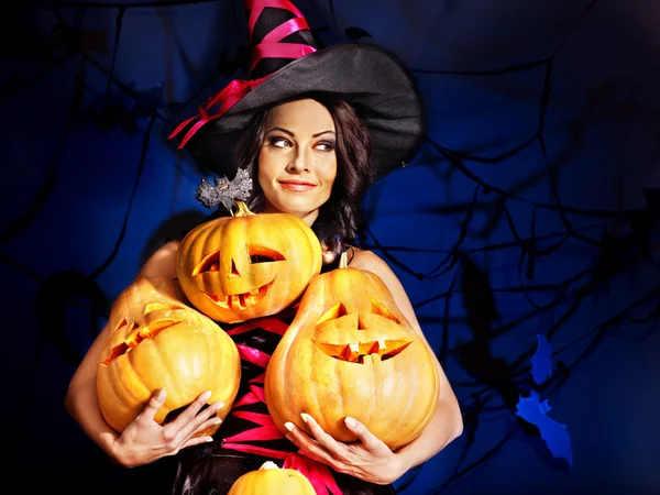 Witch holding pumpkin — Stock Photo, Image