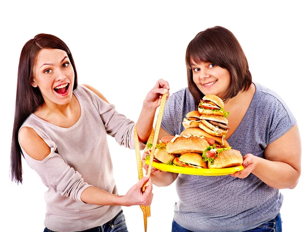 Mulher segurando fast food — Fotografia de Stock