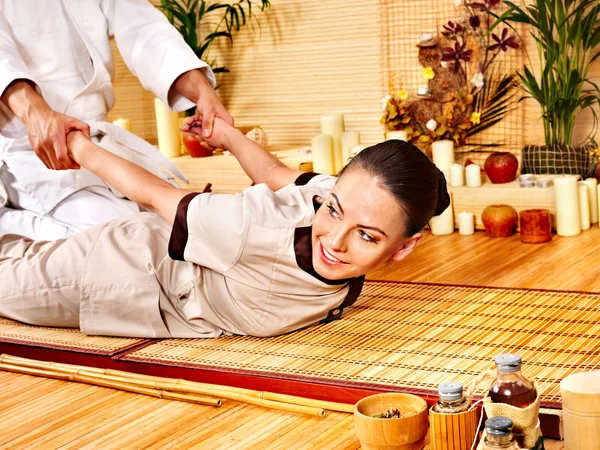 Woman getting bamboo massage. — Stock Photo, Image