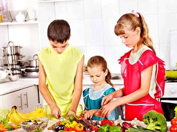 Children cooking at kitchen. — Stock Photo, Image