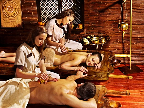 Couple having Ayurvedic spa treatment. — Stock Photo, Image