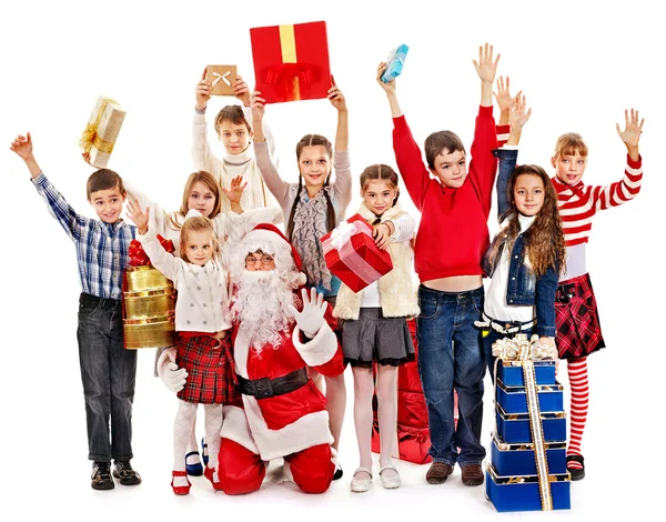 Grupo de crianças com Papai Noel . — Fotografia de Stock
