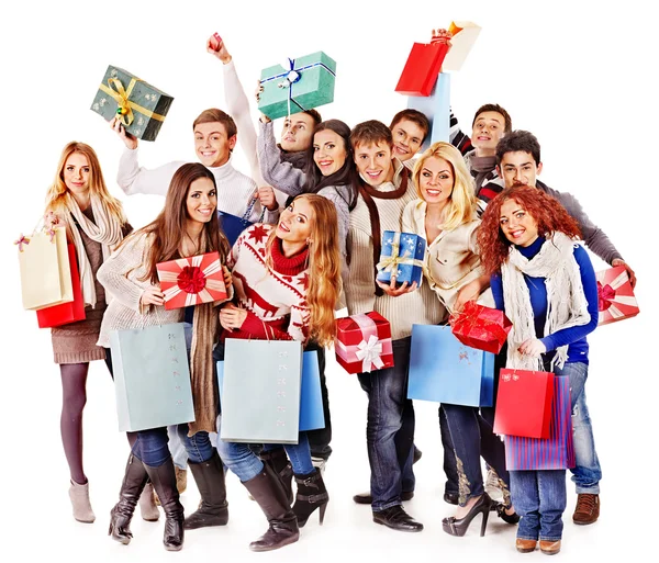 Girl in Santa hat holding Christmas gift box. — Stock Photo, Image