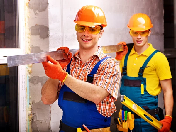 Hombres en uniforme de constructor . — Foto de Stock