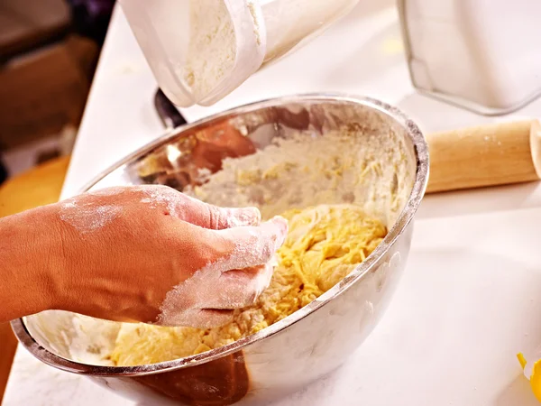 Female hand kneading dough. — Stock Photo, Image