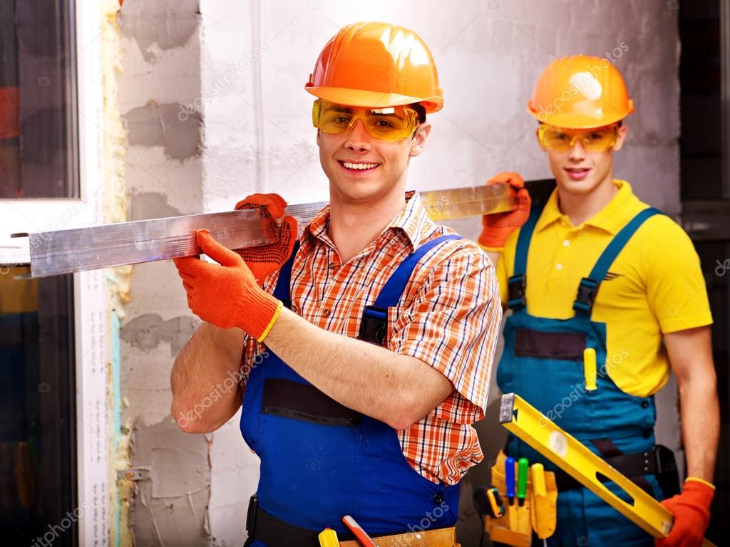 Men in builder uniform.