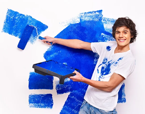 Man paint wall at home. — Stock Photo, Image