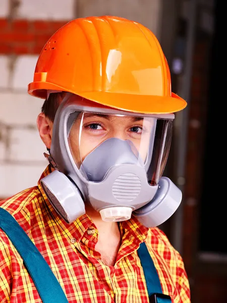 Man in builder respirator. Royalty Free Stock Images