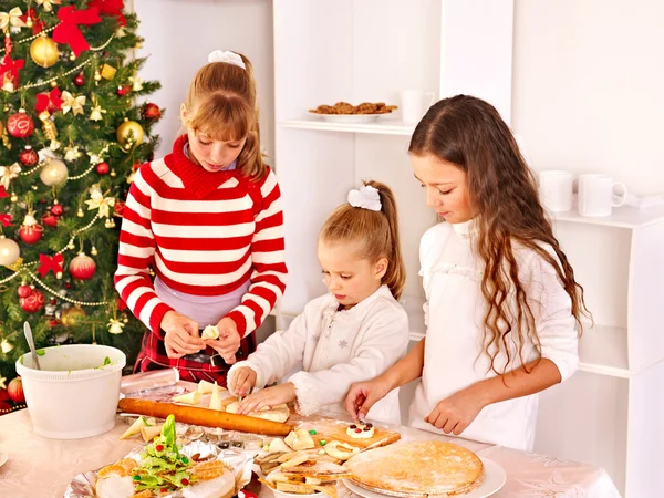 Children rolling dough in kitchen. — Stock Photo, Image