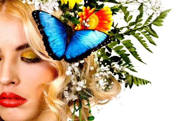 Frau mit Schmetterling und Blume — Stockfoto