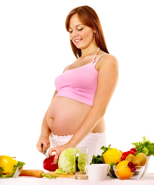 妊娠中の女性は食糧を準備します。 . — ストック写真