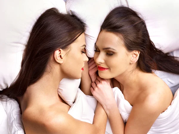 Two sexy lesbian women  erotic foreplay game in bed. — Stock Photo, Image