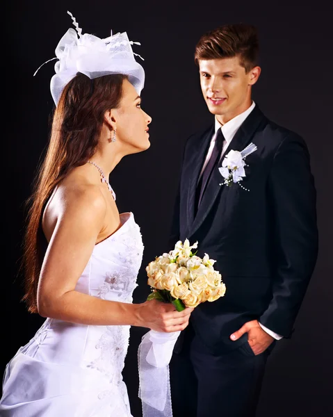 Couple wearing wedding dress and costume. — Stock Photo, Image