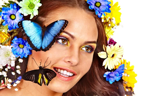 Woman with flower and  butterfly. — Stock Photo, Image