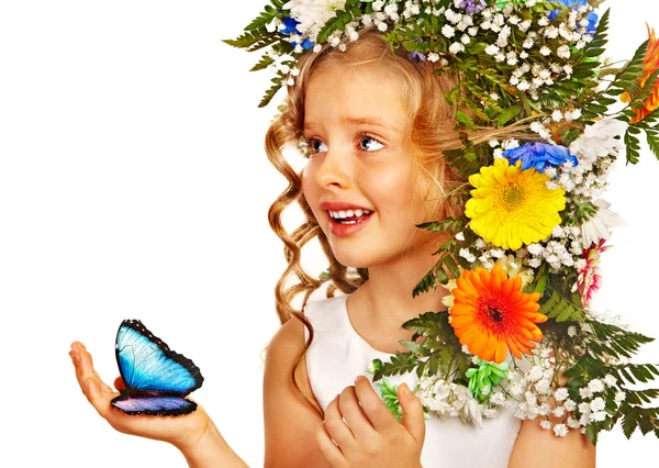 Маленькая девочка с цветочной прической . — стоковое фото