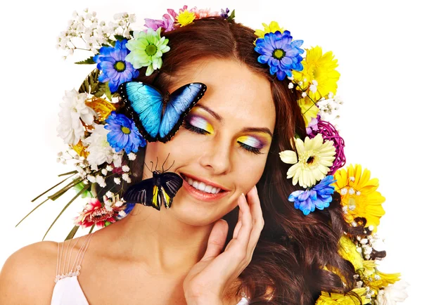 Woman with flower and  butterfly. Stock Picture