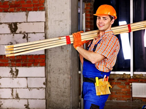 Férfi builder egyenruhában. — Stock Fotó