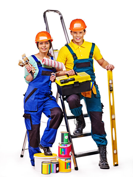 Couple builder  with construction tools.