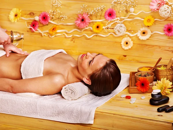 Woman getting stone therapy massage . — Stock Photo, Image