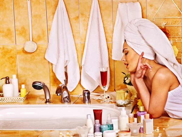 Woman relaxing at home bath. Stock Image