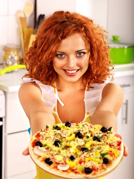 Happy woman cooking pizza. — Stock Photo, Image