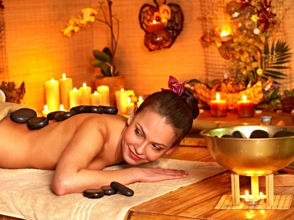 Woman getting stone therapy massage . — Stock Photo, Image