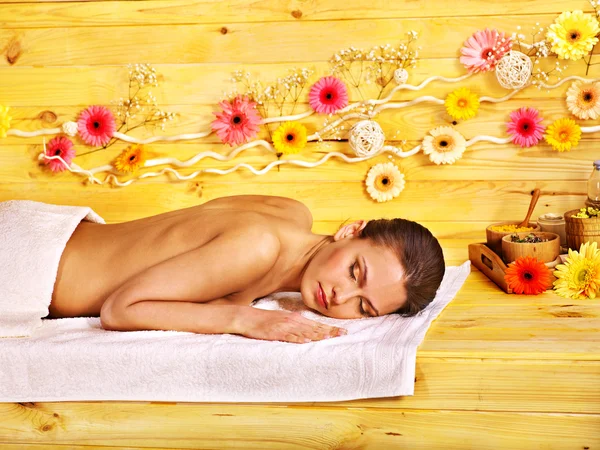 Woman getting herbal ball massage. — Stock Photo, Image