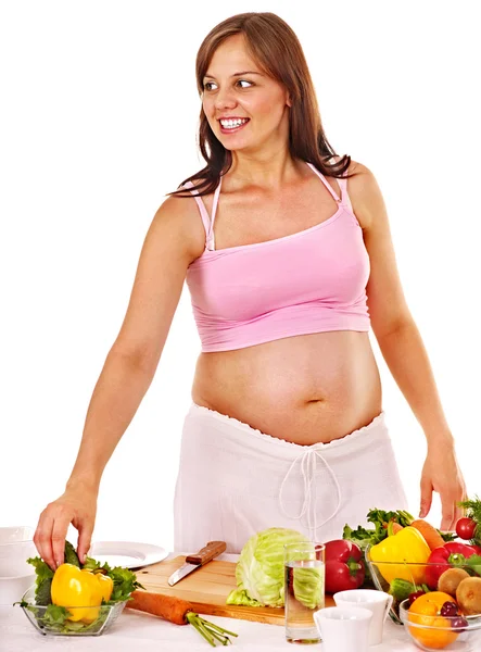 Kobieta w ciąży przygotowywania żywności . — Zdjęcie stockowe