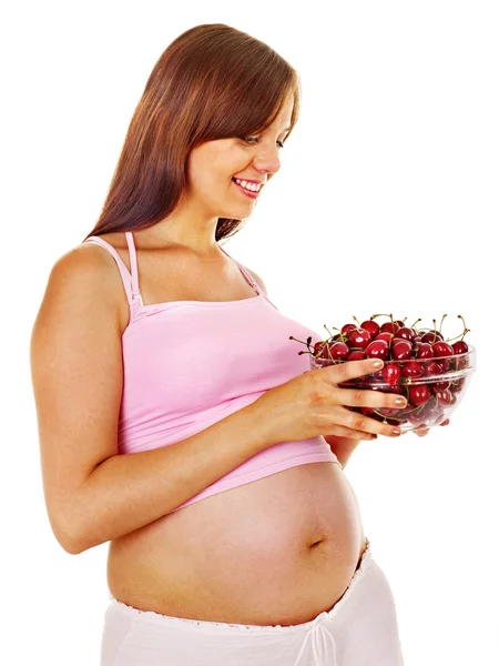 Femme enceinte mangeant des fruits . — Photo