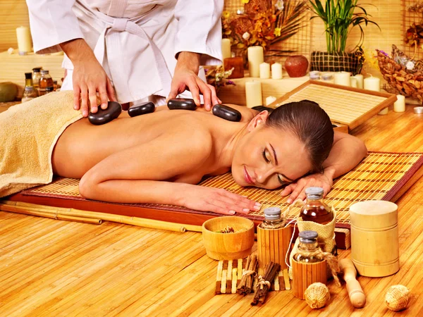 Woman getting stone therapy massage . — Stock Photo, Image