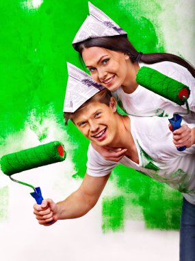 Happy couple with rollers clipart